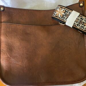 Brown Leather Crossbody Bag with Decorative Strap